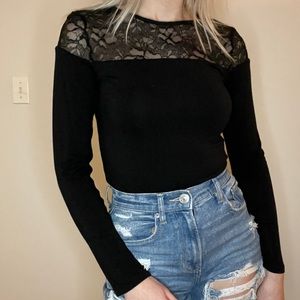 Black long sleeve with lace in size small